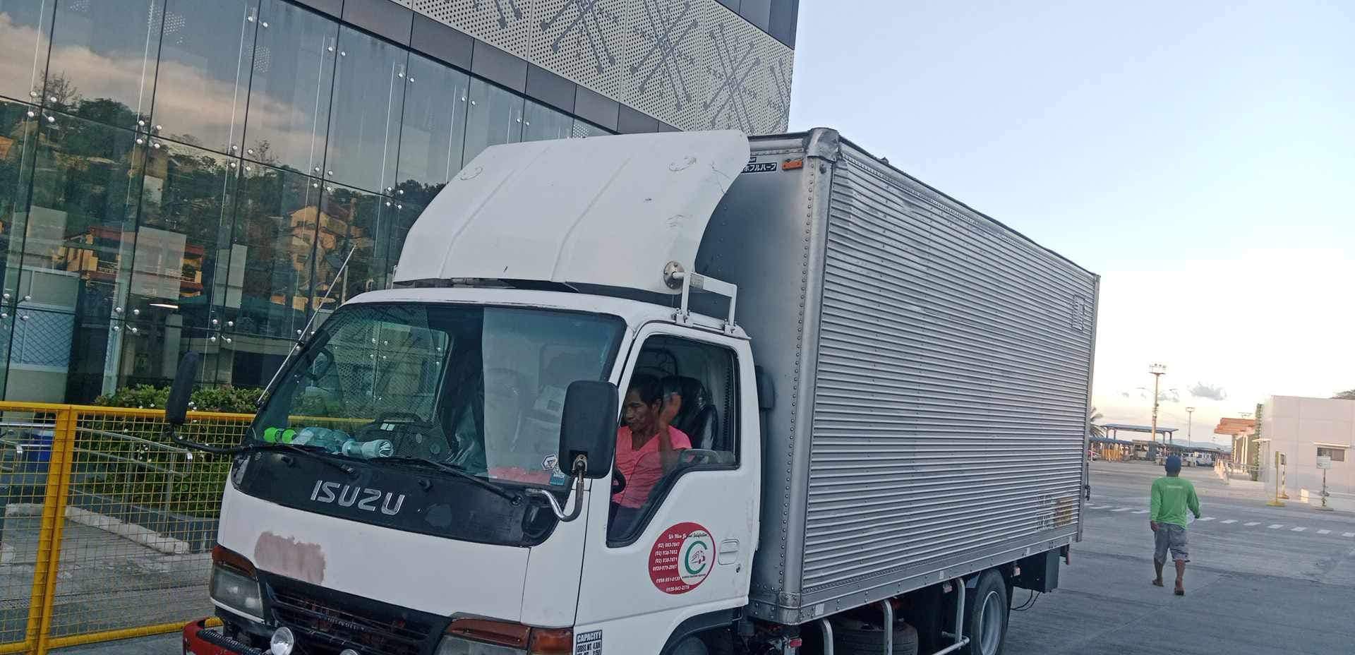 Elaiza's Trucking handling cargo and field operations